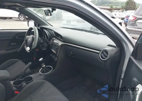 2014 Scion Tc 10 Series/Monogram z USA, uszkodzony, nr VIN JTKJF5C71E3072185